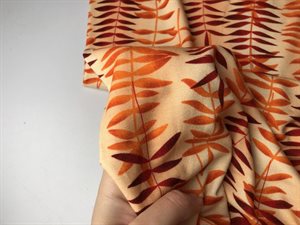 Viscosejersey - friske orange toner og blade